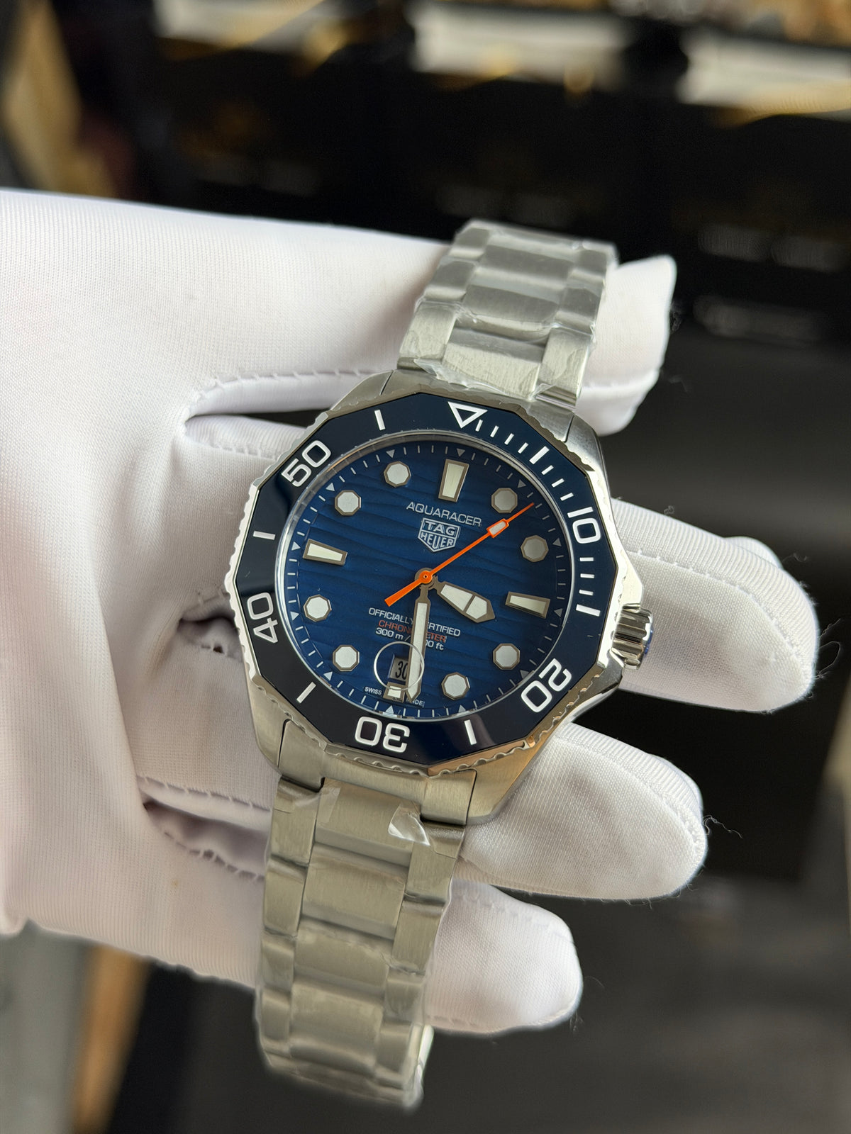 Silver with Blue Dial.