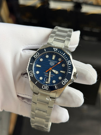 Silver with Blue Dial.