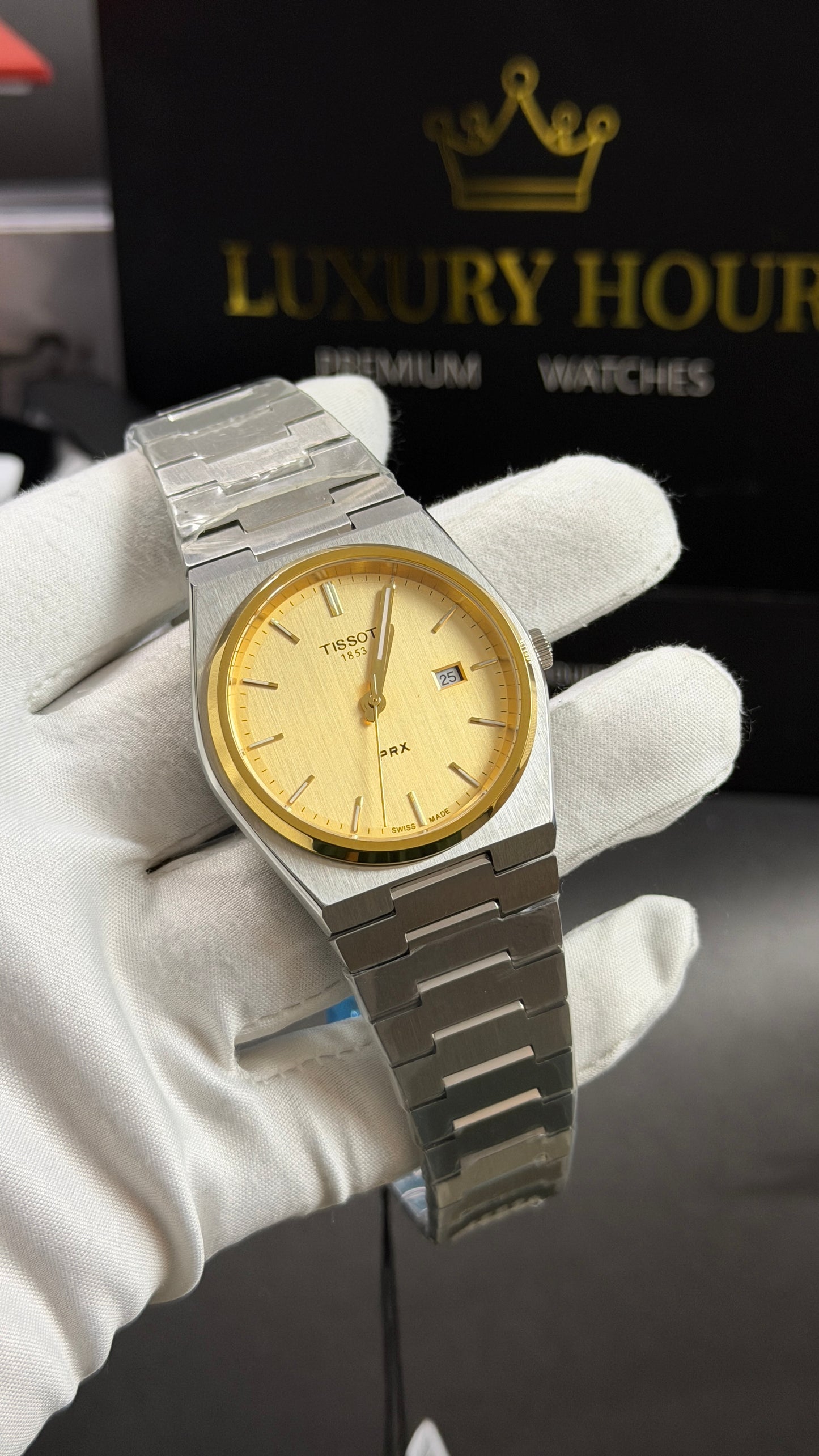 Silver with Yellow Gold Dial.