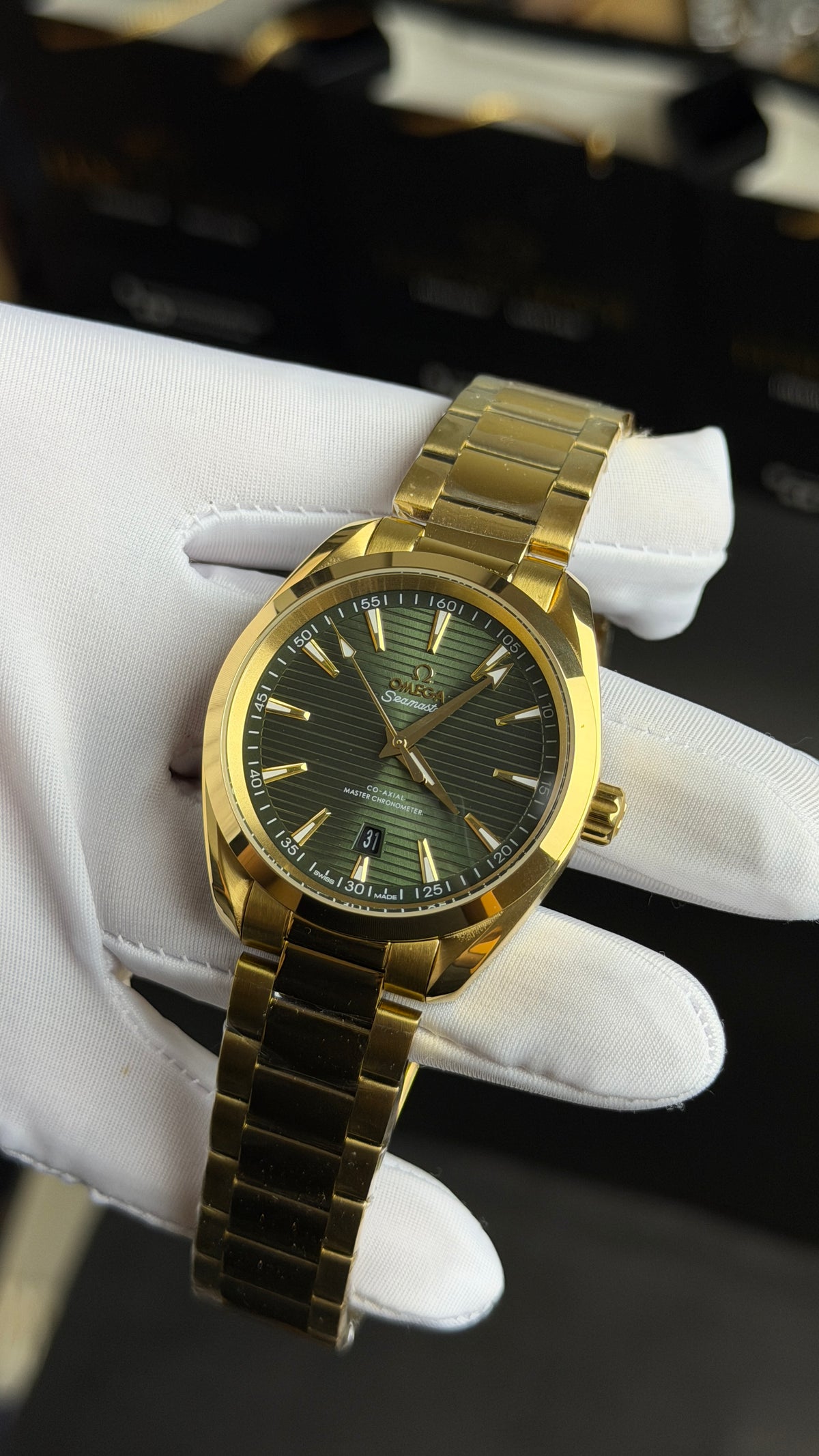 Yellow Gold with Olive Green Dial.