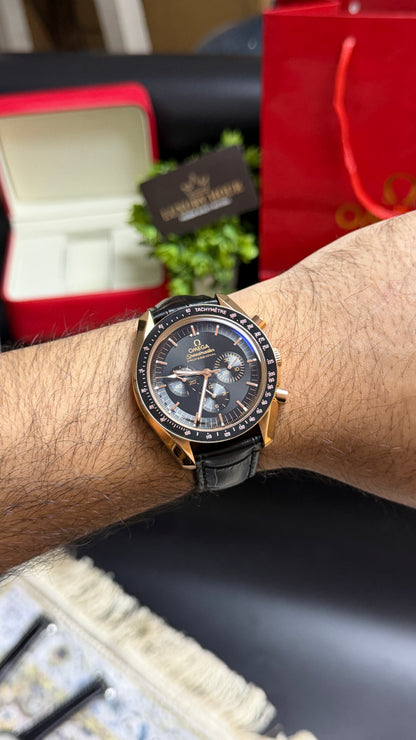 Rose Gold with Black Dial.