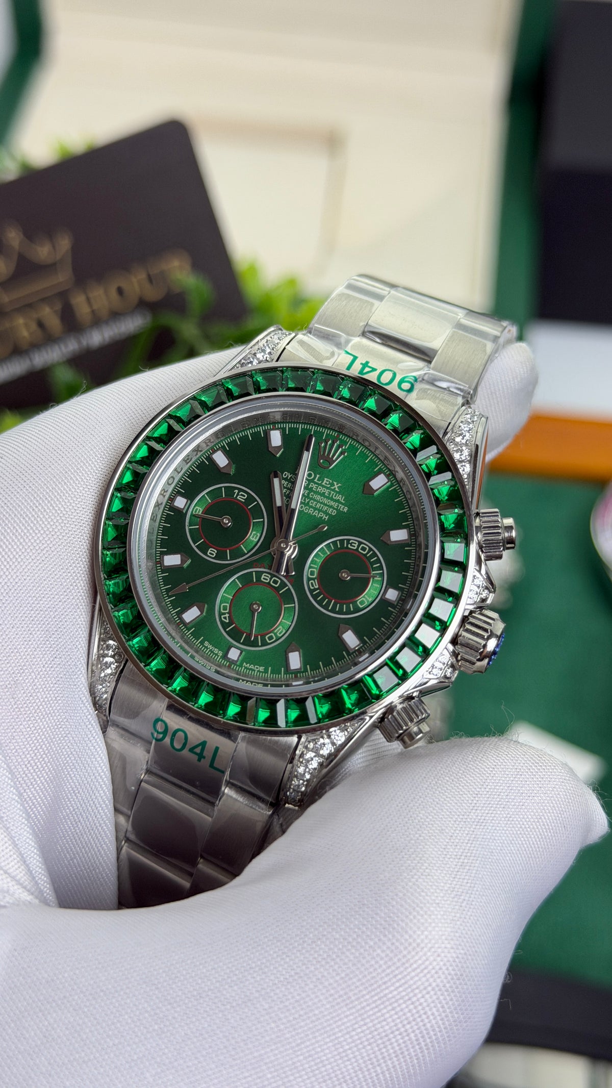 Silver with Green Dial.