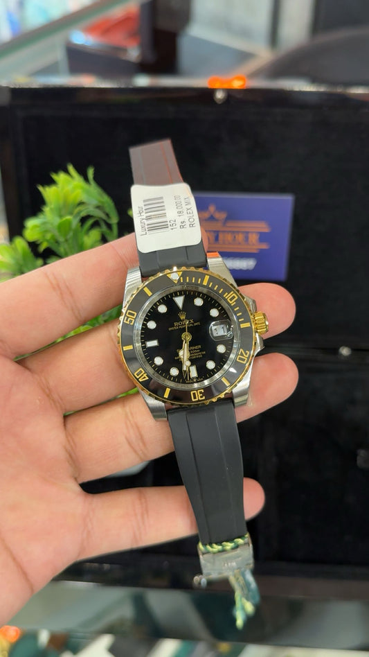 Gold two tone with black dial