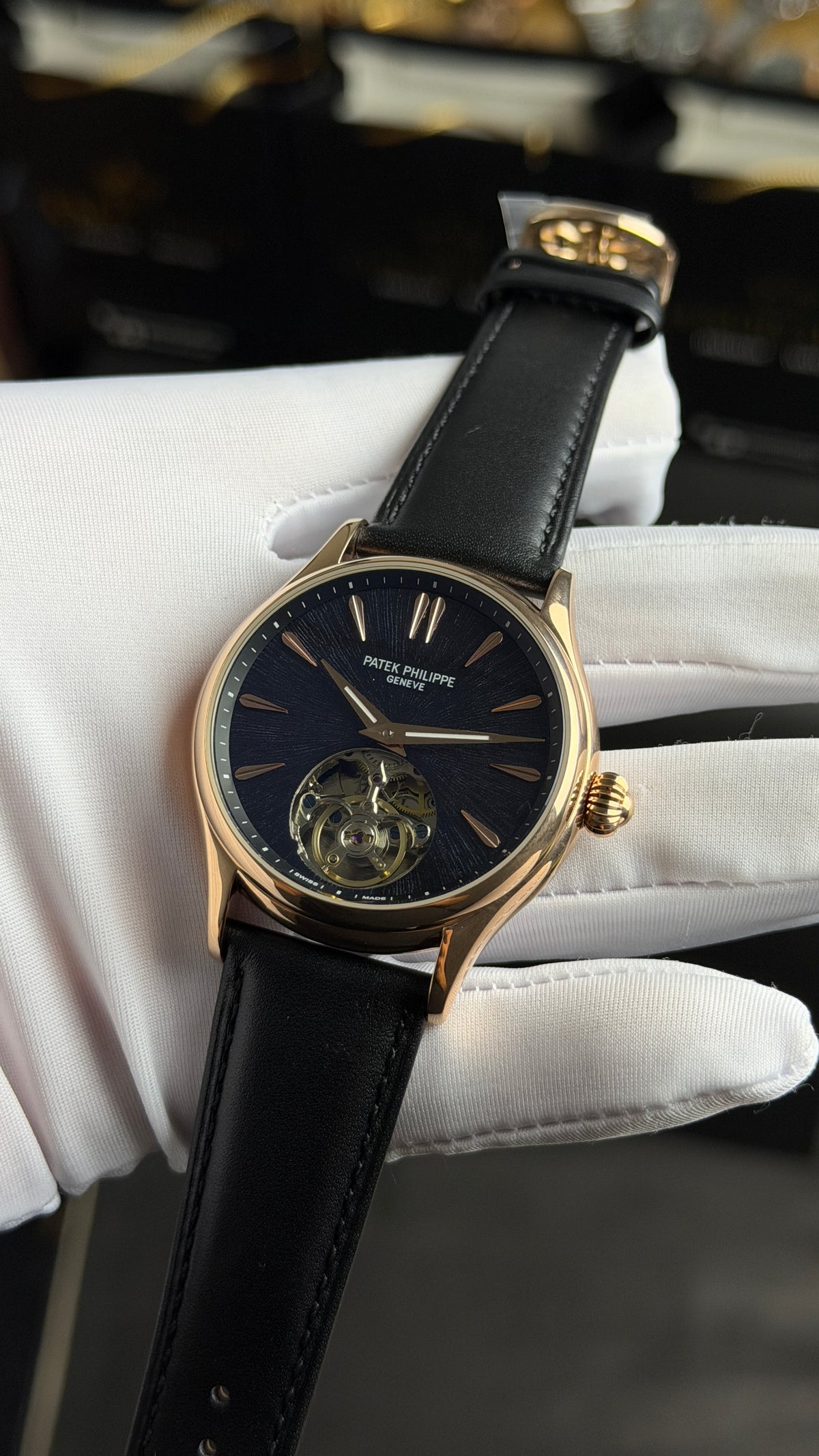 Rose Gold with Black Dial.