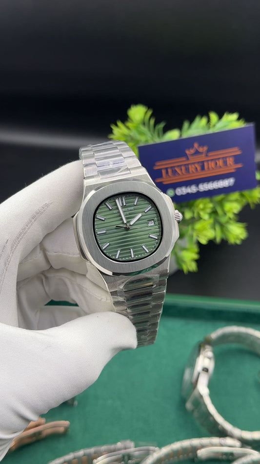 Silver with green dial
