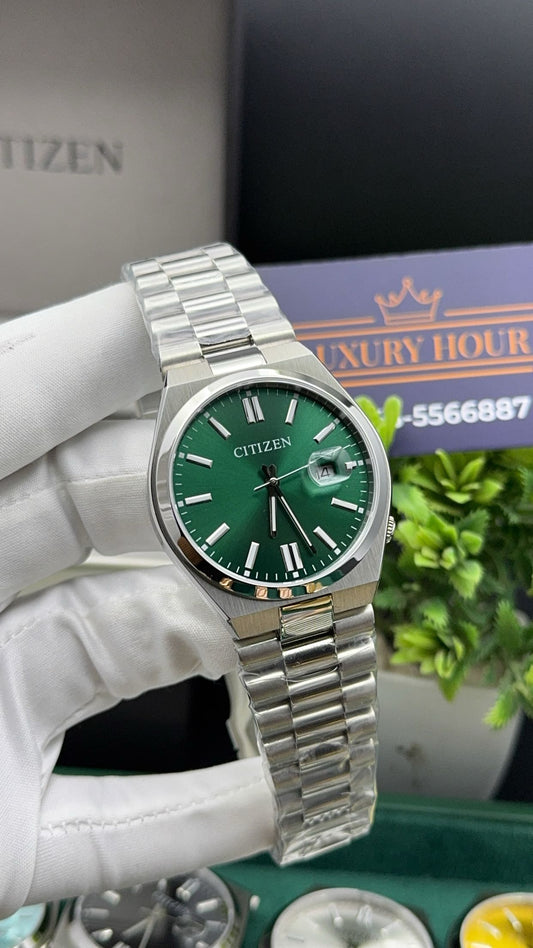 Silver with green dial