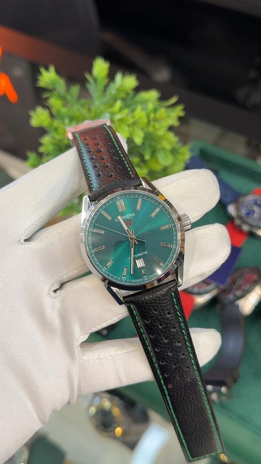 Silver with green dial