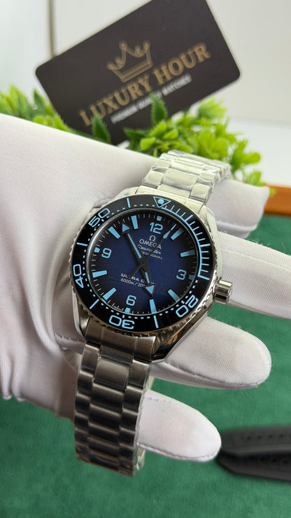 Silver with Blue Dial.