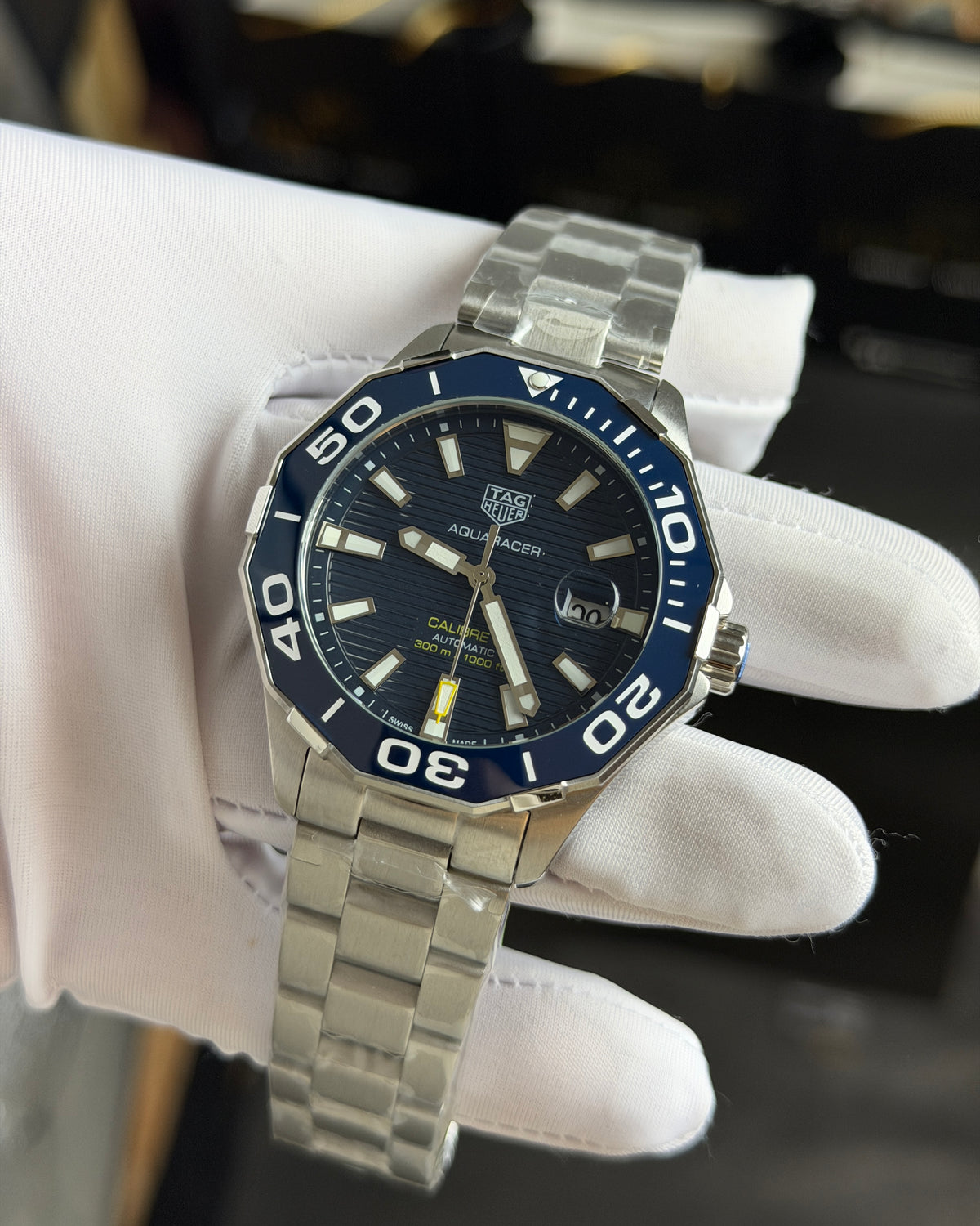 Silver with Blue Dial.