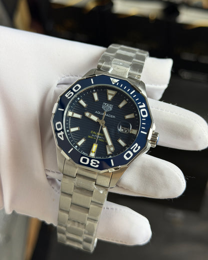 Silver with Blue Dial.