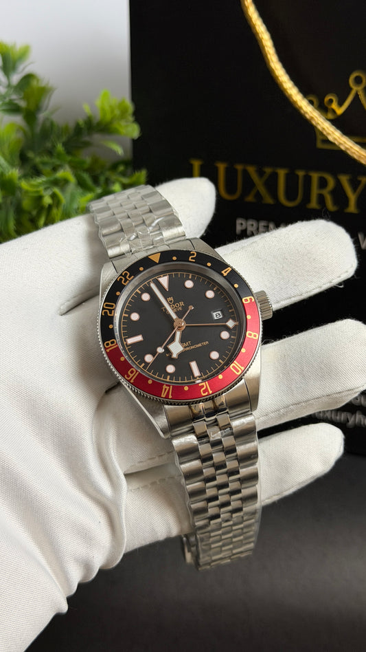 Silver with Black Dial.