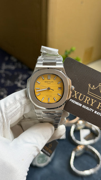 Silver with Yellow Dial.