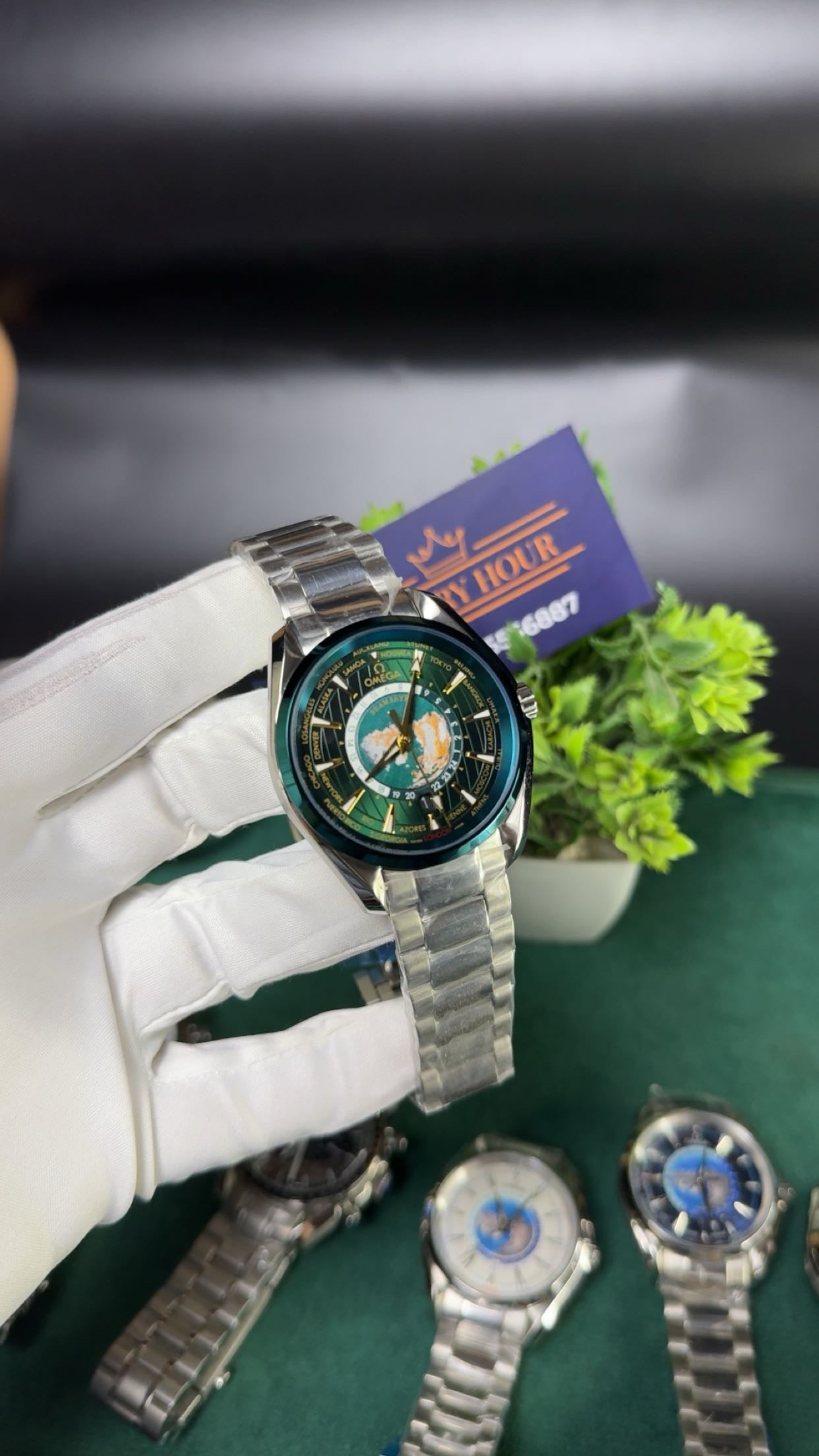 Silver with green dial