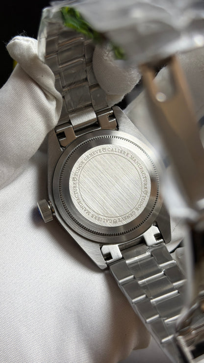 Silver with Black Dial.