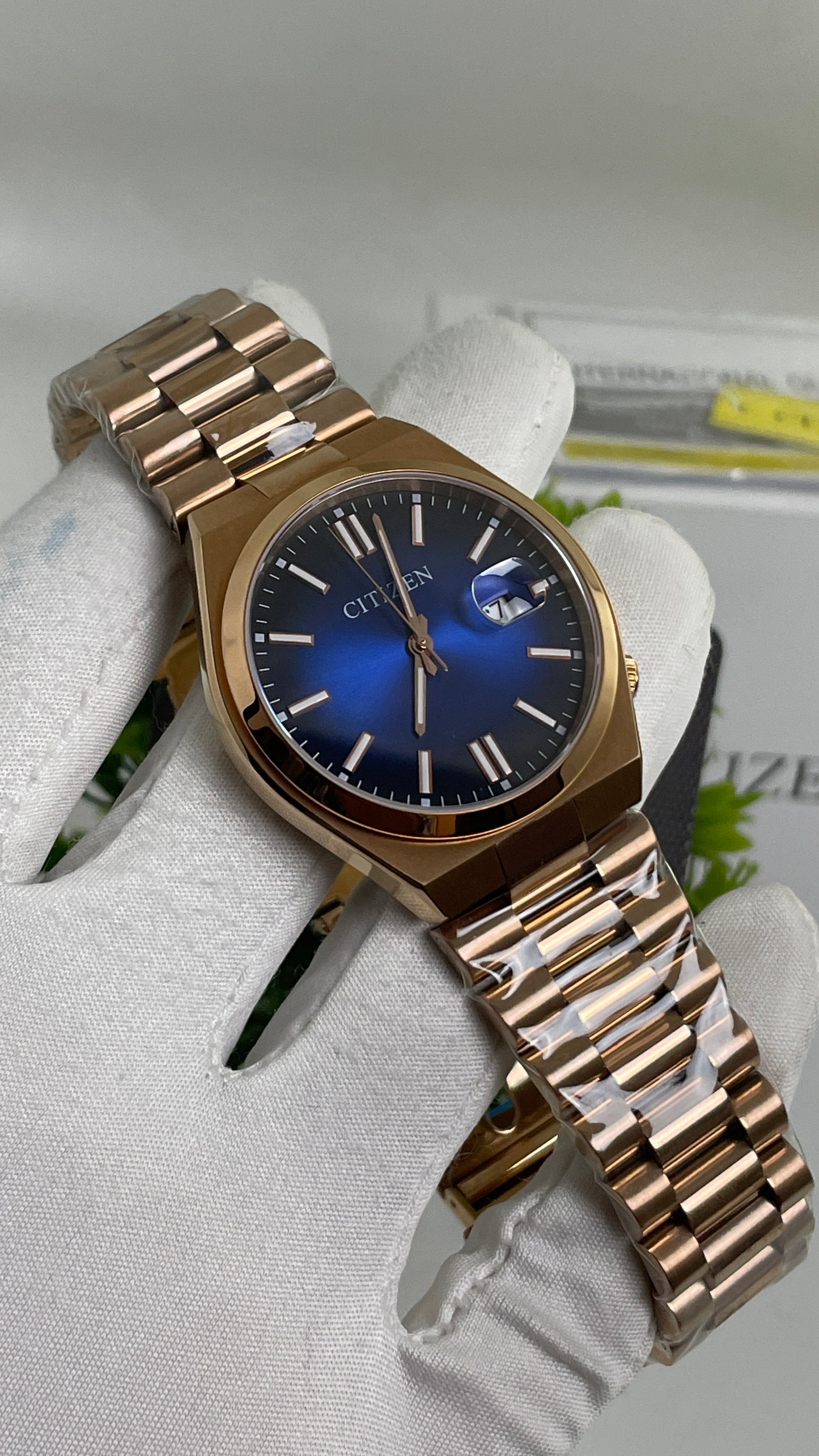 Rose Gold with Aqua Dial.
