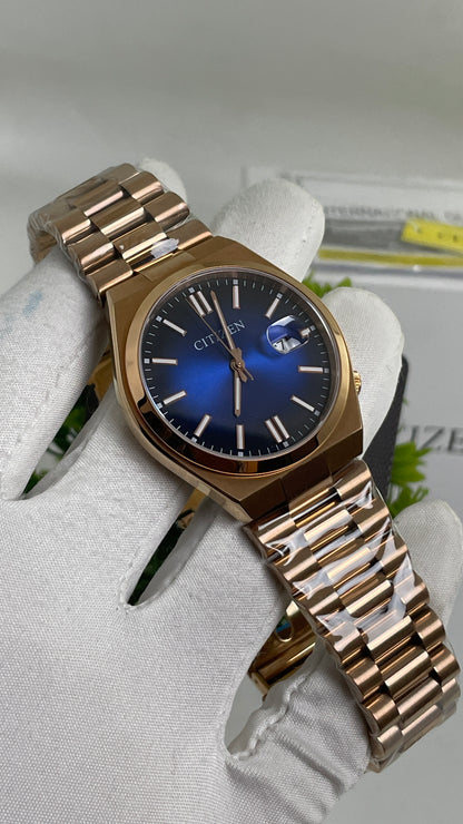 Rose Gold with Aqua Dial.