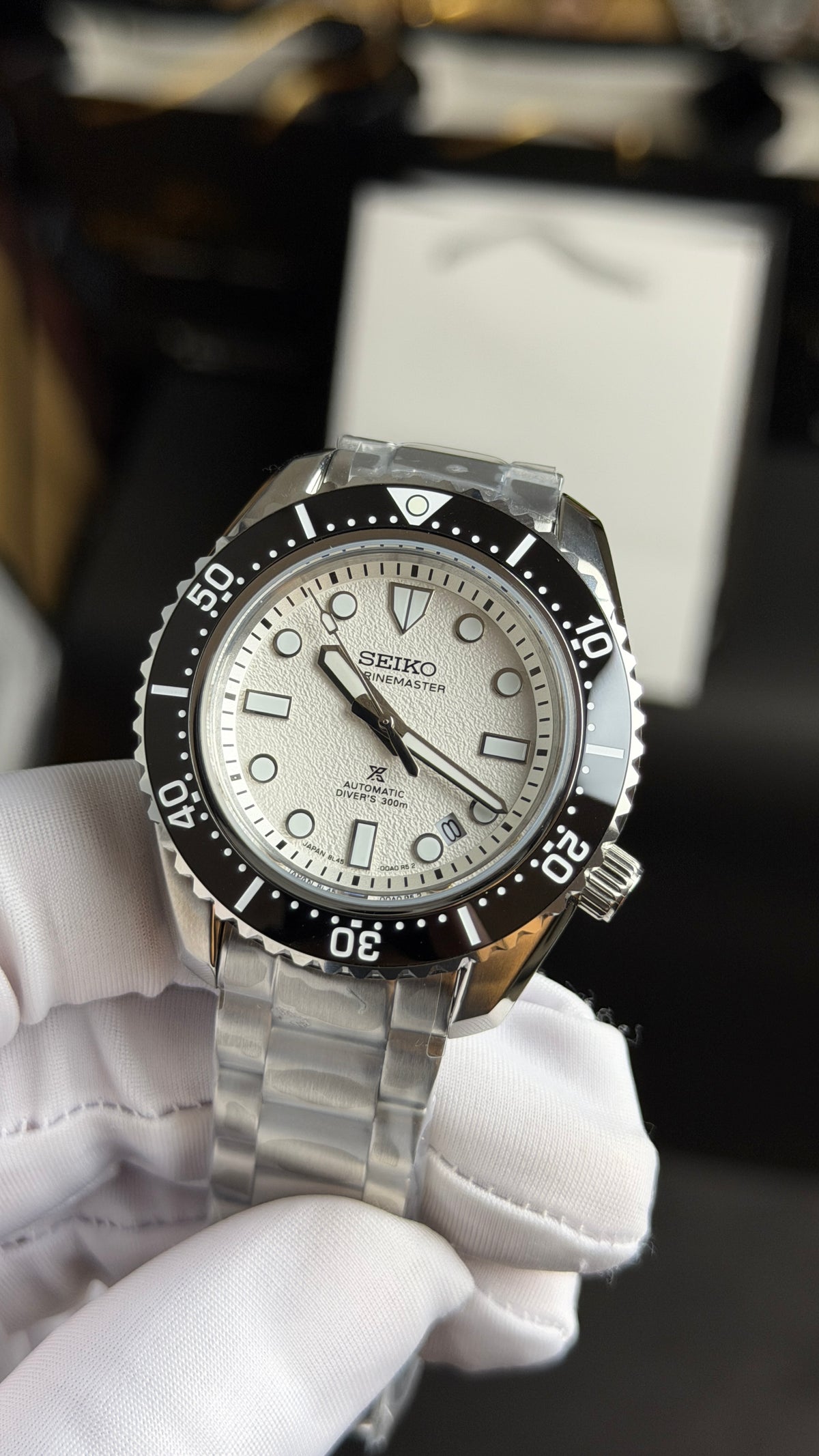 Silver with White Dial.