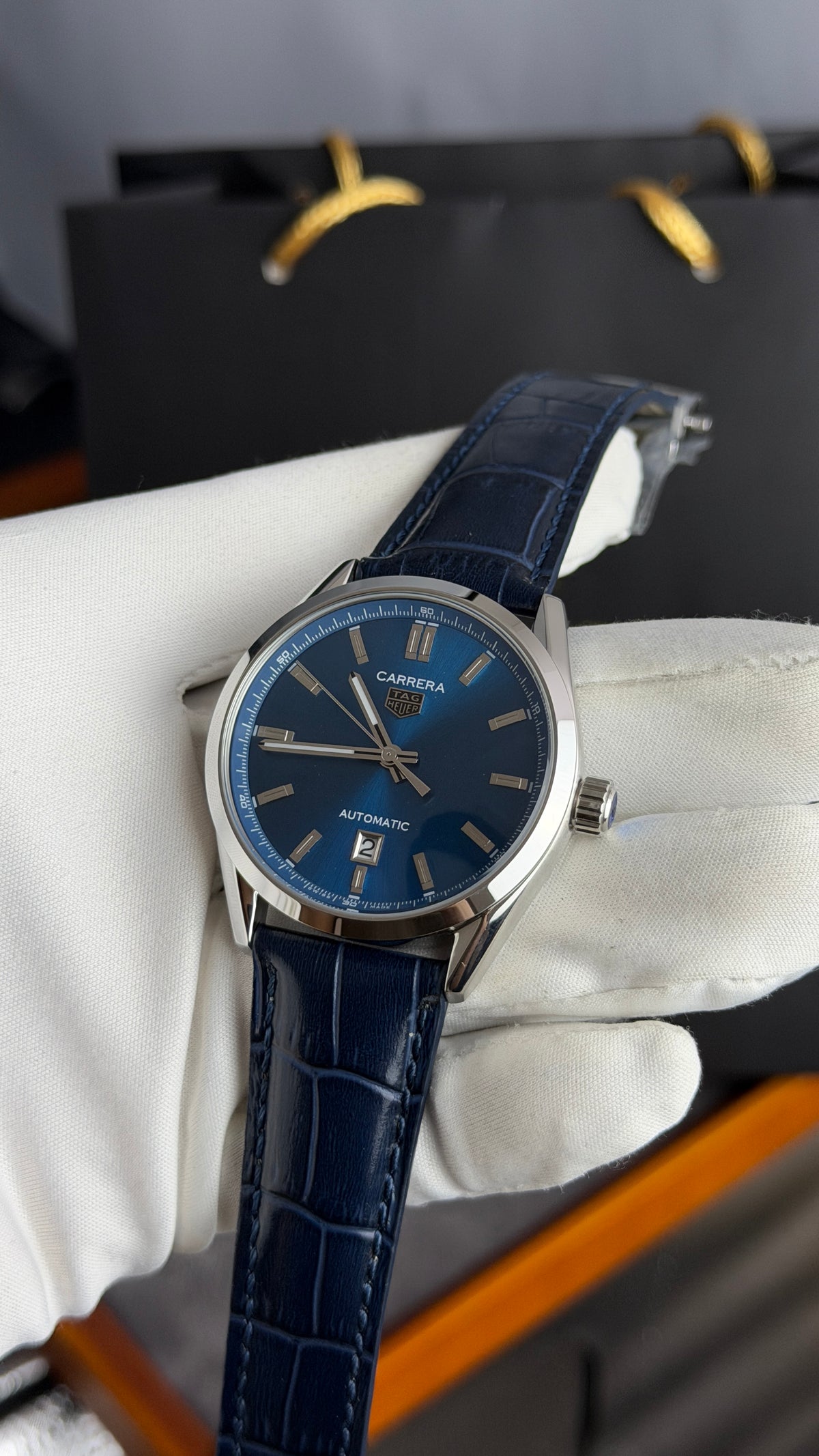 Silver with Aqua Dial.