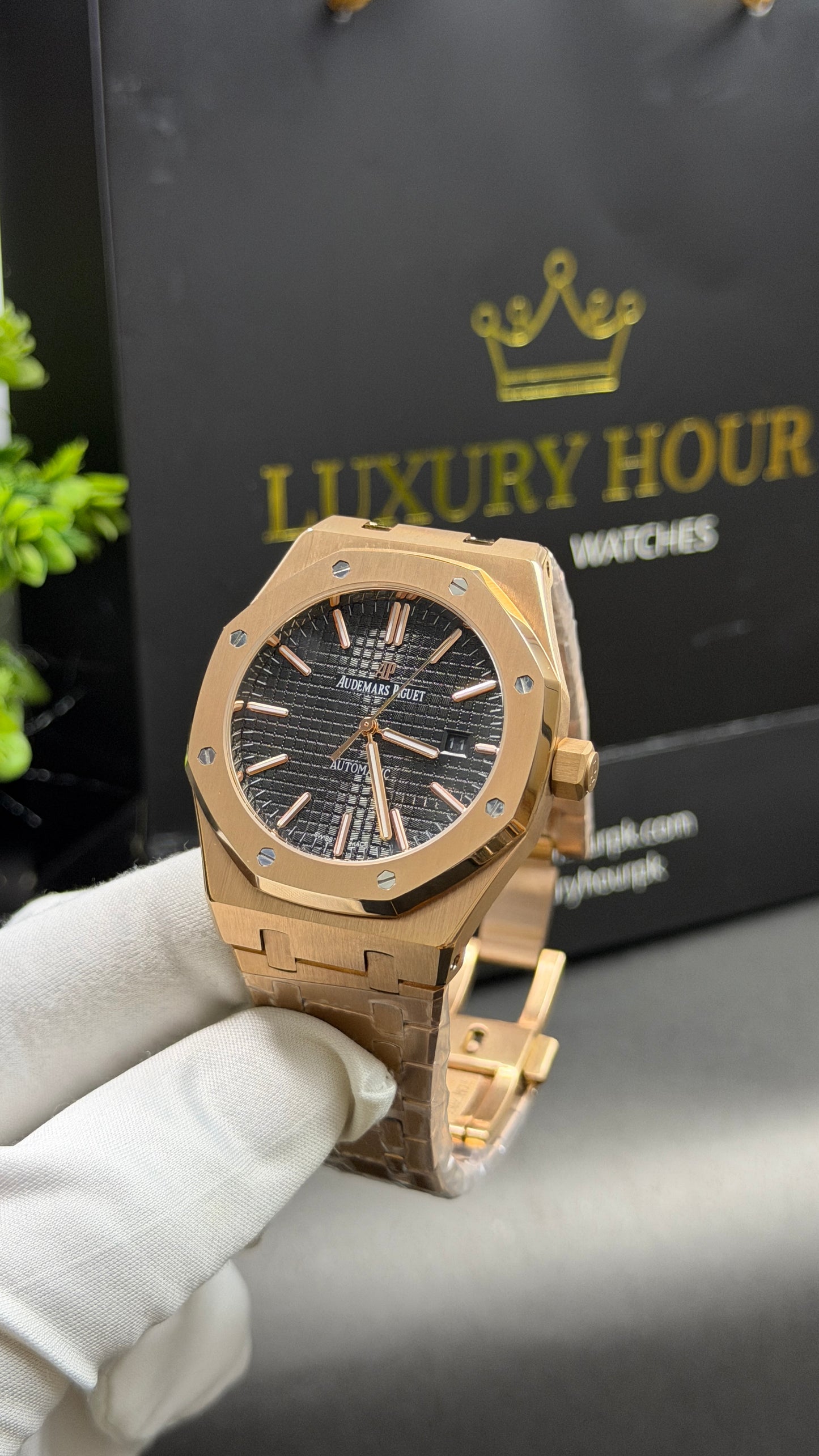 Rose Gold with Black Dial.