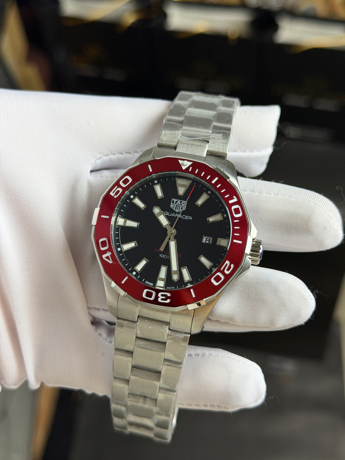 Silver with Black Dial.