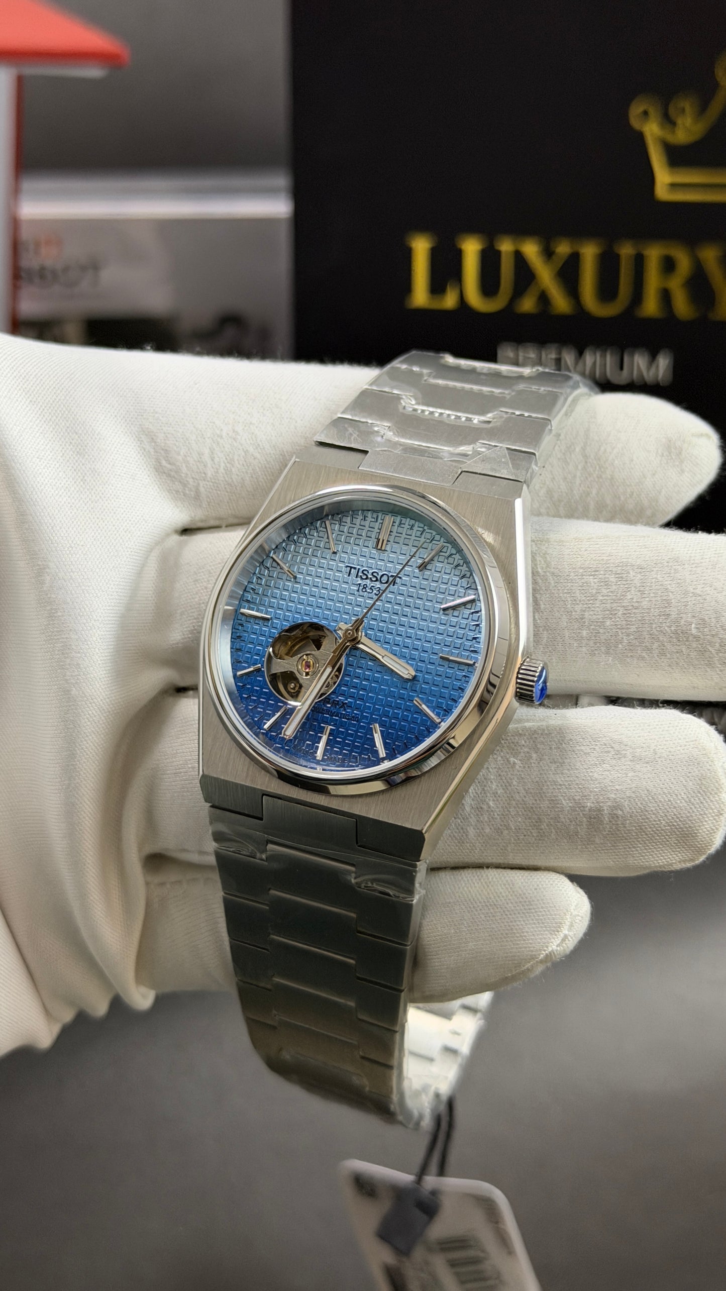Silver with Sky Blue Dial.
