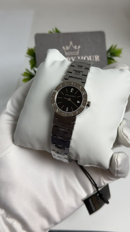 Silver with Black Dial.