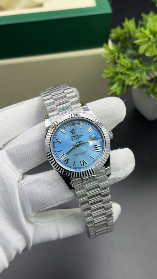 Silver with sky blue dial