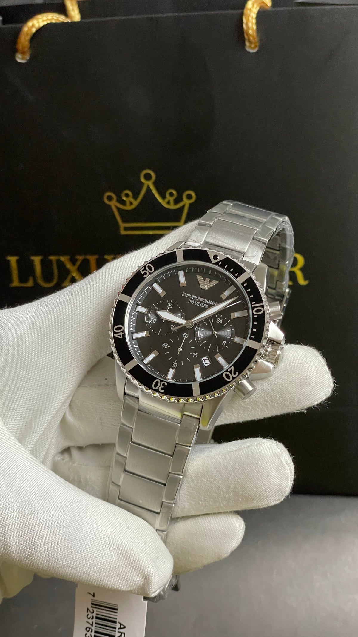 Silver with Black Dial.