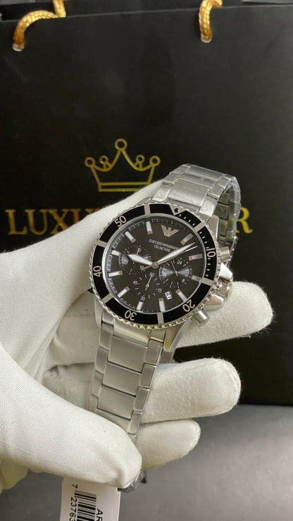 Silver with Black Dial.