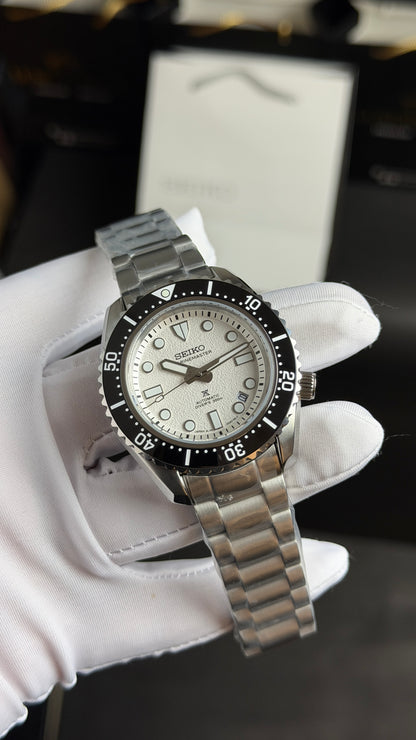 Silver with White Dial.