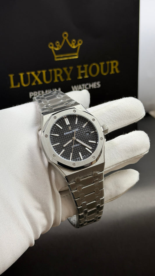 Silver with Black Dial.