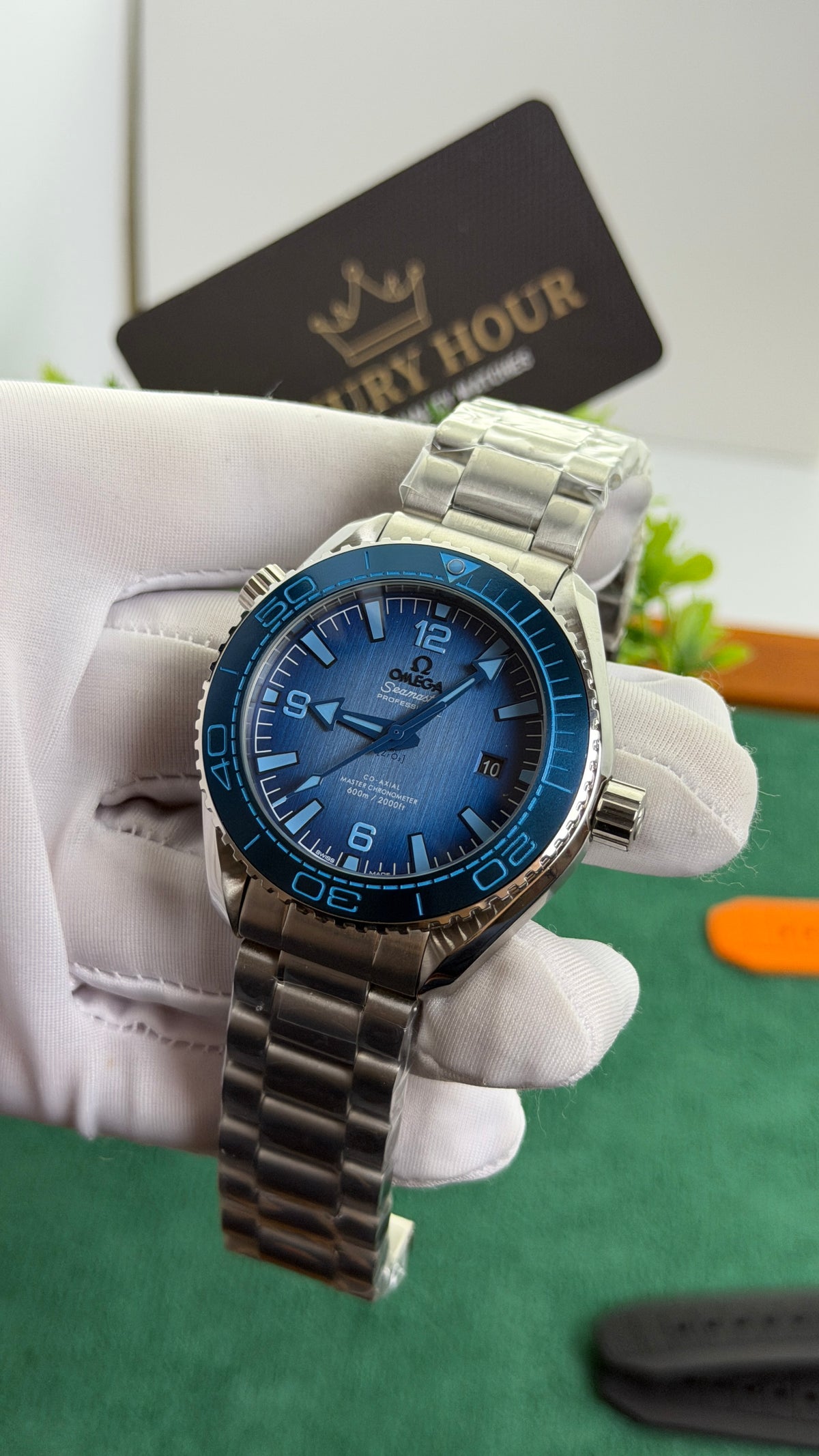 Silver with Blue Dial.