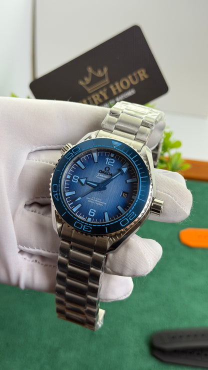 Silver with Blue Dial.