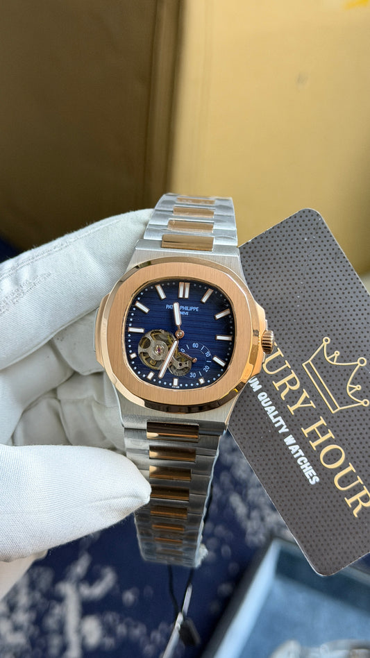 Rose Gold Two Tone with blue dial.