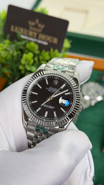 Silver with Black Dial.