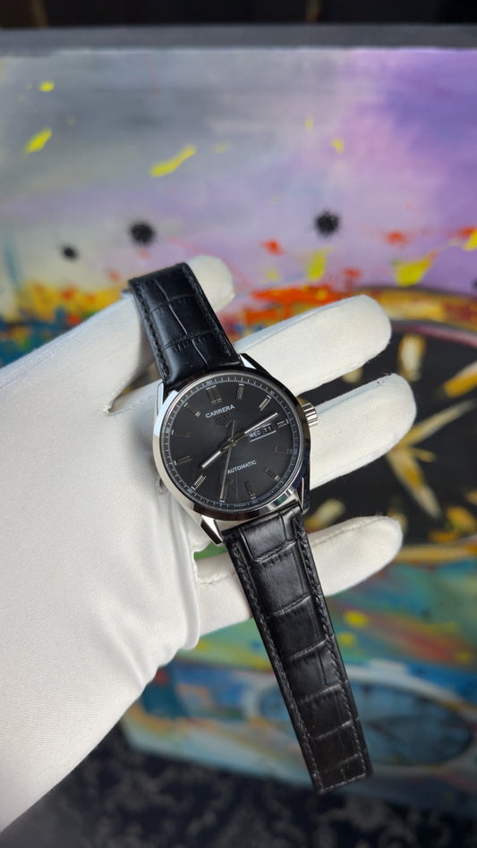 Silver with black dial