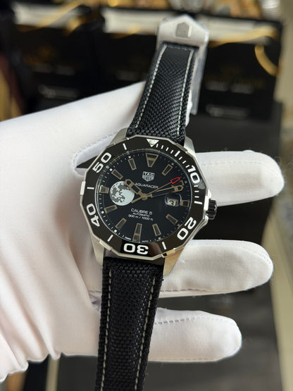 Silver with Black Dial.
