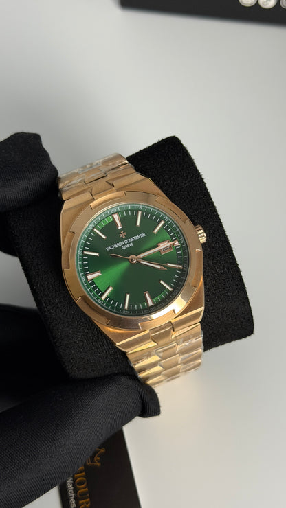 Rose Gold with Green Dial.