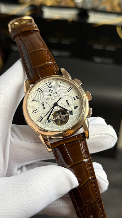 Rose Gold with White Dial.