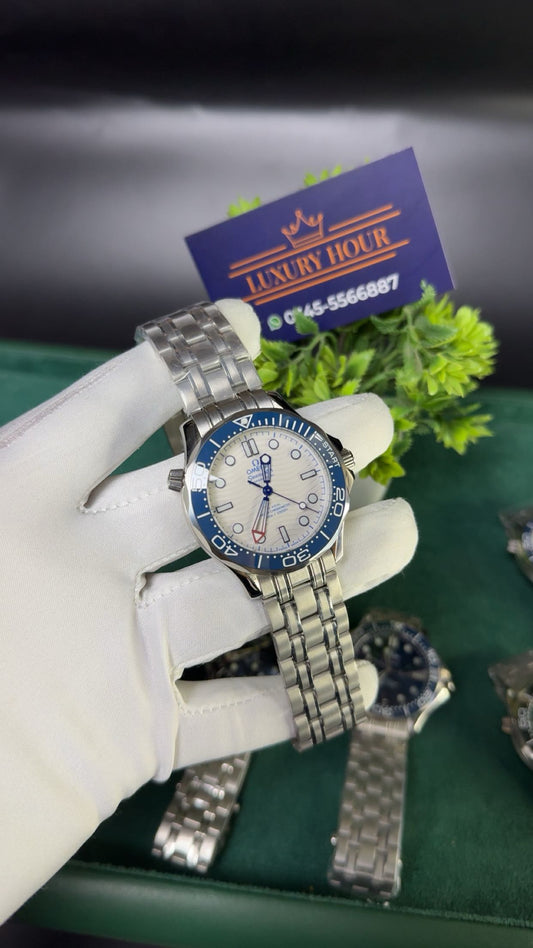 Silver with white dial and blue bezel