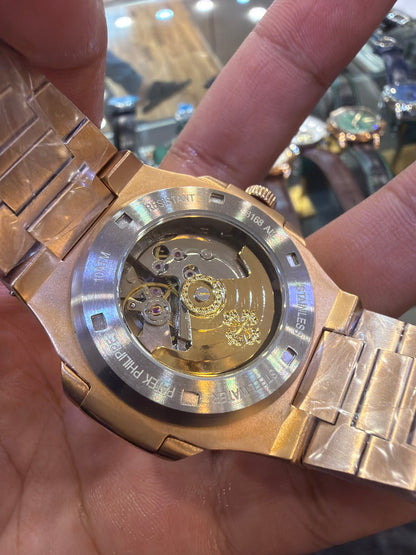 Rose Gold Two Tone with Chocolate Dial.