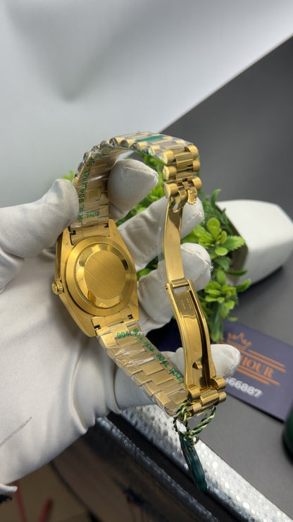 Yellow Gold with Green dial🔥