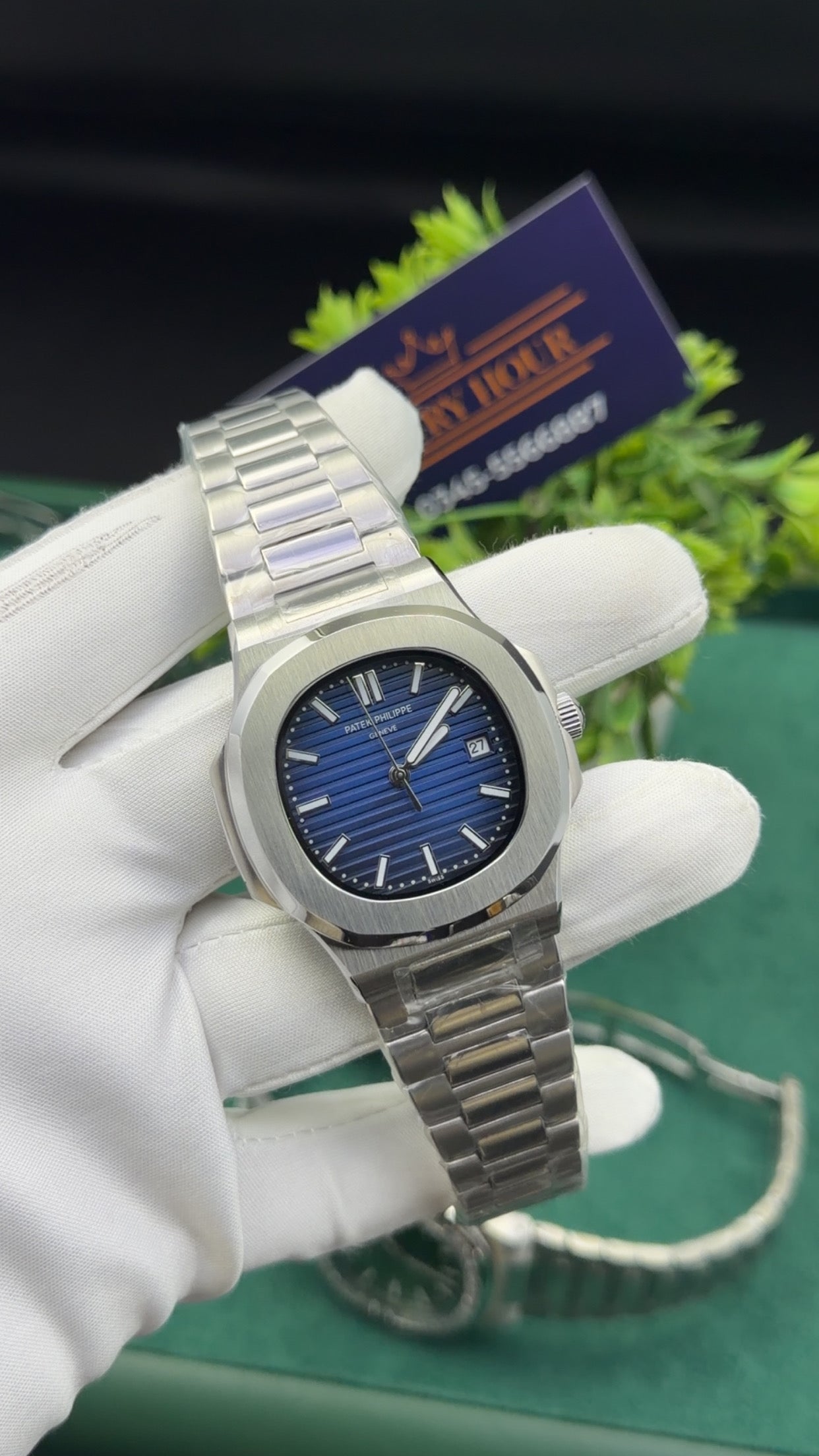 Silver with blue dial