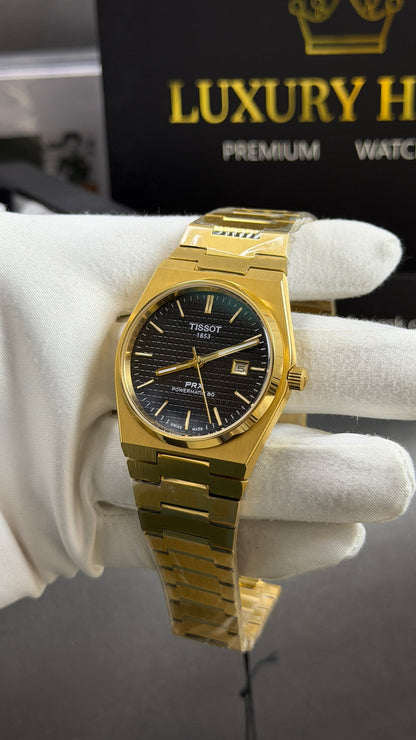 Yellow Gold with Black Dial.