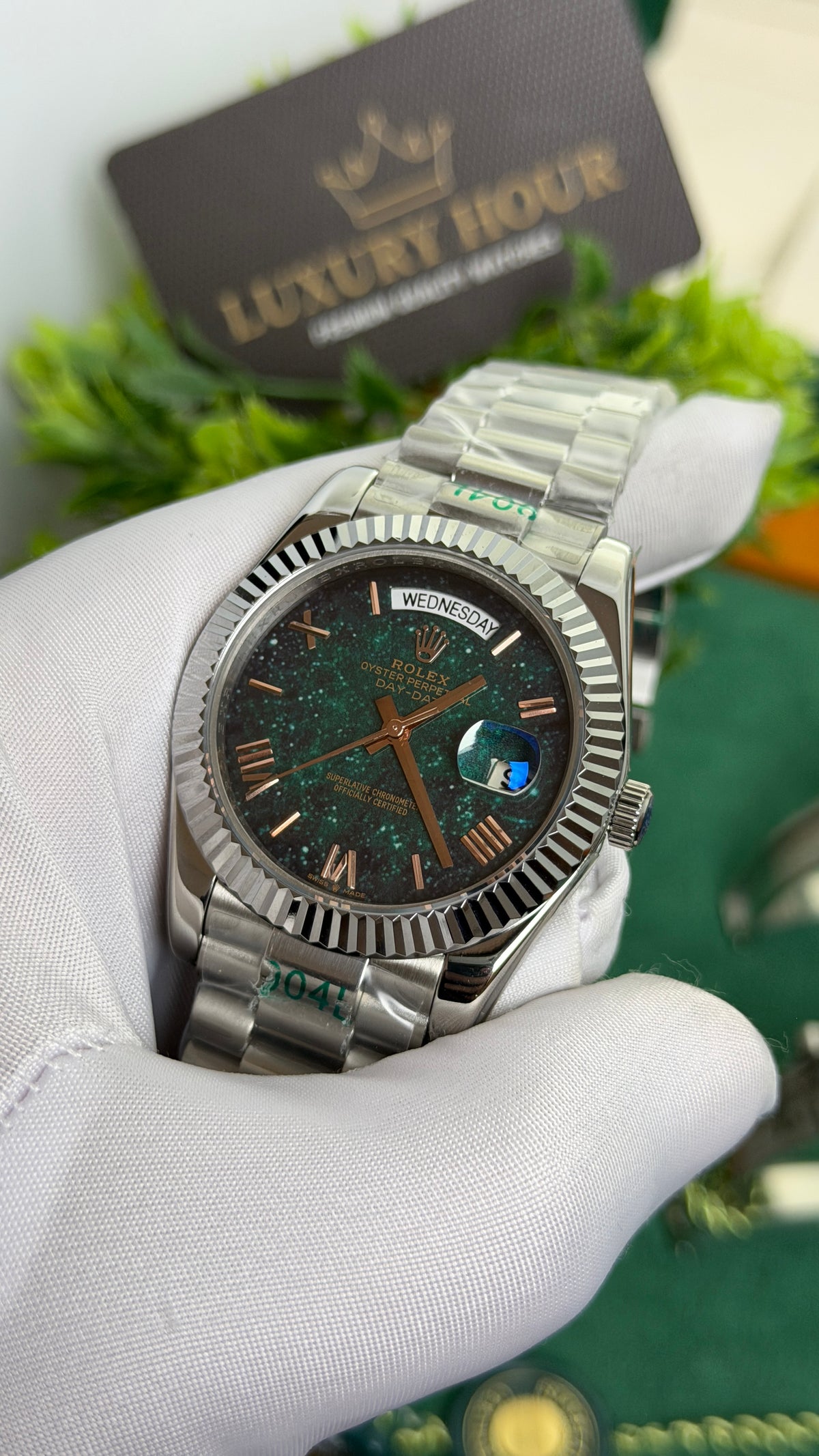 Silver with Green Galaxy Dial.
