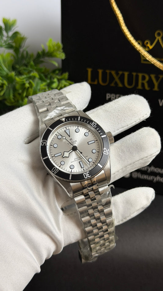 Silver with White Dial.