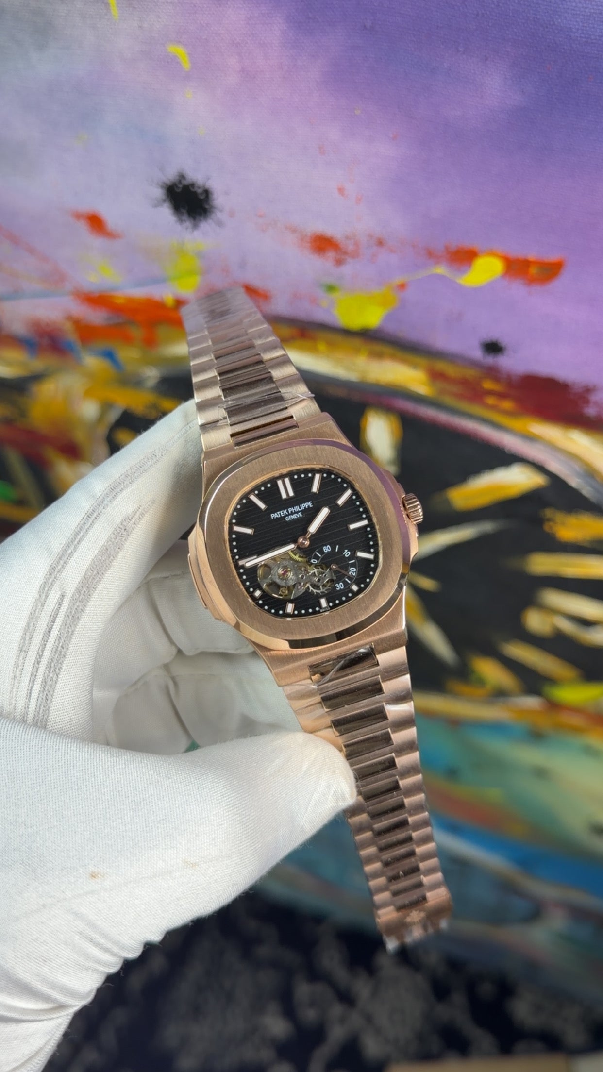 Rose gold with black dial