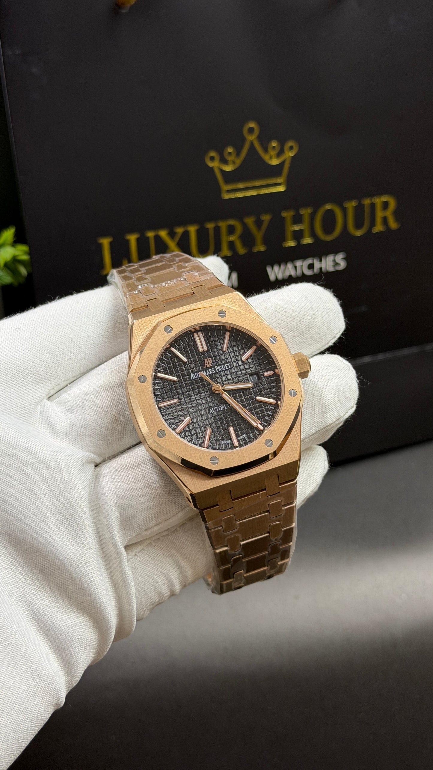 Rose Gold with Black Dial.