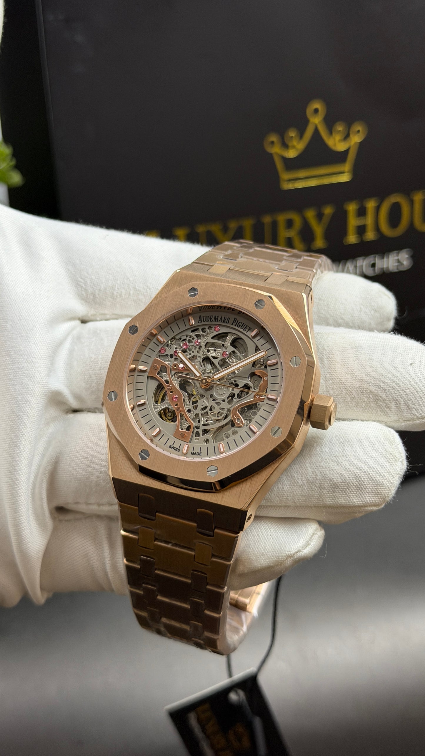 Rose Gold with White Skeleton Dial.