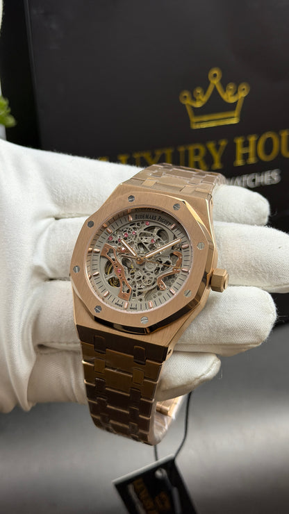 Rose Gold with White Skeleton Dial.